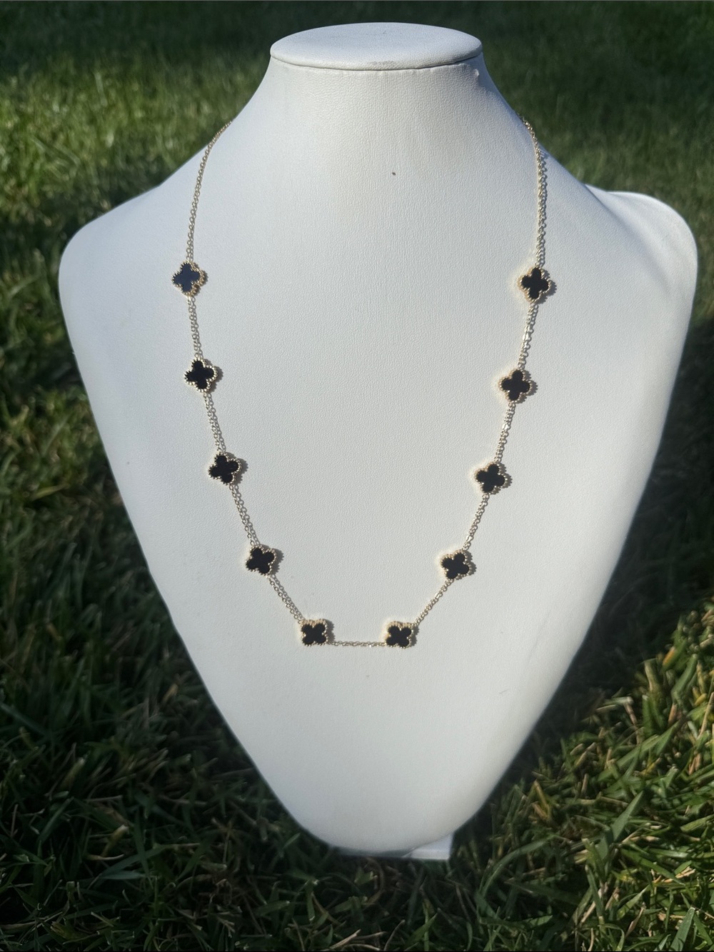 Gold Tone Necklace with Black Clover Motif